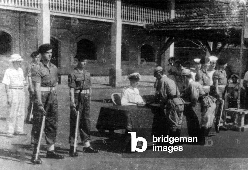 Japanese officers surrender to the British in Saigon, 1945 (photo)