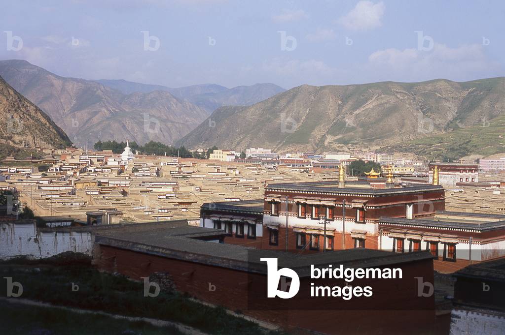 China: The view from the Grand Gold Tile Temple Hall across Labrang Monastery, Xiahe, Gansu province