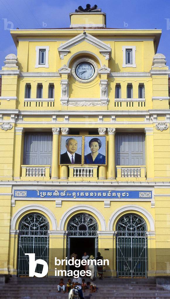Cambodia: The Central Post Office with portaits of ex-King Sihanouk and his wife Queen Monique, Phnom Penh