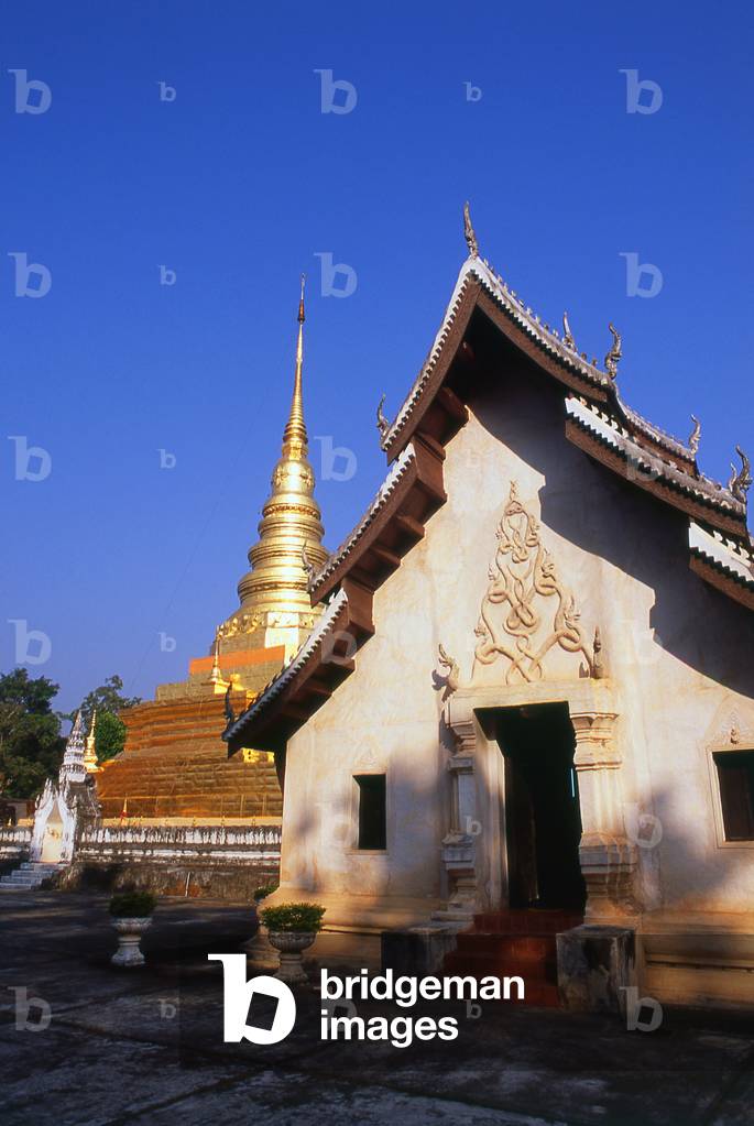 Thailand: The gilded chedi and viharn of Wat Phra That Chae Haeng, Nan, North Thailand
