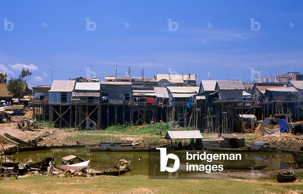 Cambodia: Stilted riverside housing (showing just how high the Tonle Sap River can rise), Kompong Chhnang