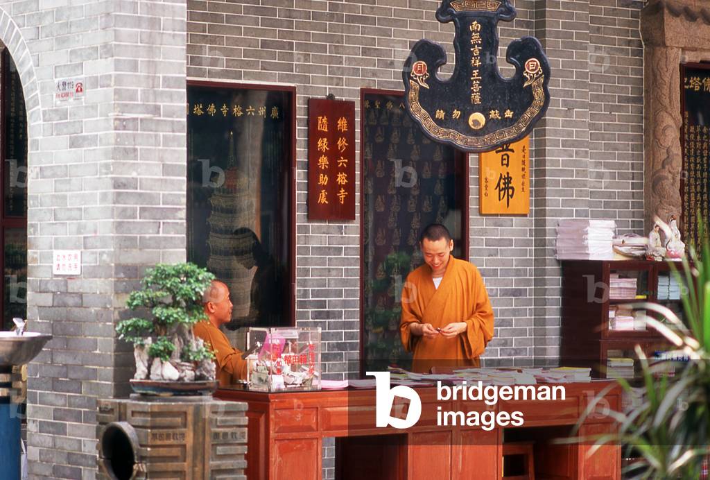 China: Monks at the Temple of the Six Banyan Trees (Liurongsi), Guangzhou, Guangdong Province