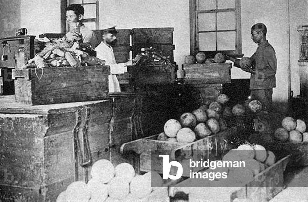 China: Unpacking opium cases at the Government Opium Factory in Taihoku (Taipei) during Japanese rule (1895-1945) c. 1905