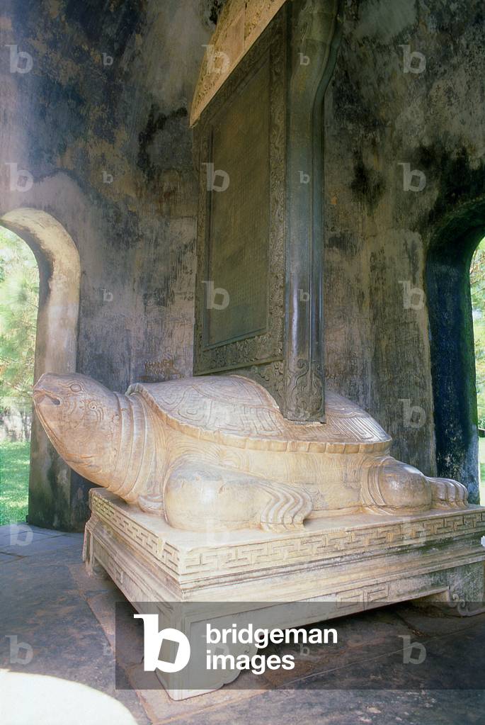 Vietnam: A marble turtle with a stone stele on its back (the text on the stele was penned by Lord Nguyen Phuc Chu in 1715 and describes the new temple and extols Buddhism), Thien Mu Pagoda, Hue
