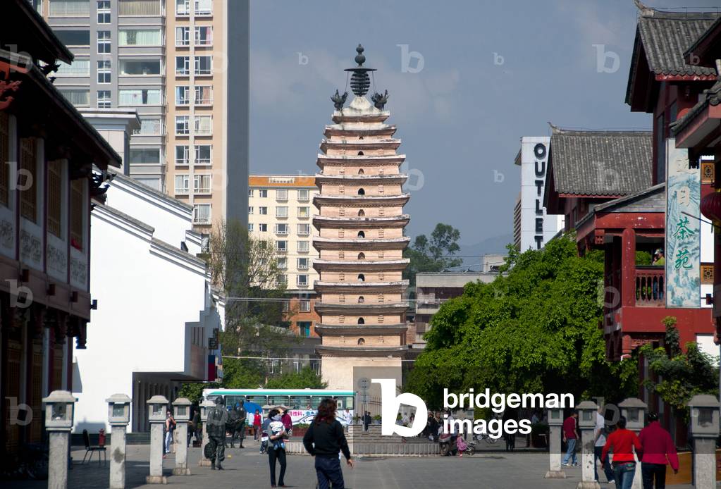 China: Walking street between the East and West pagodas (Xisi Ta or West Pagoda in background)