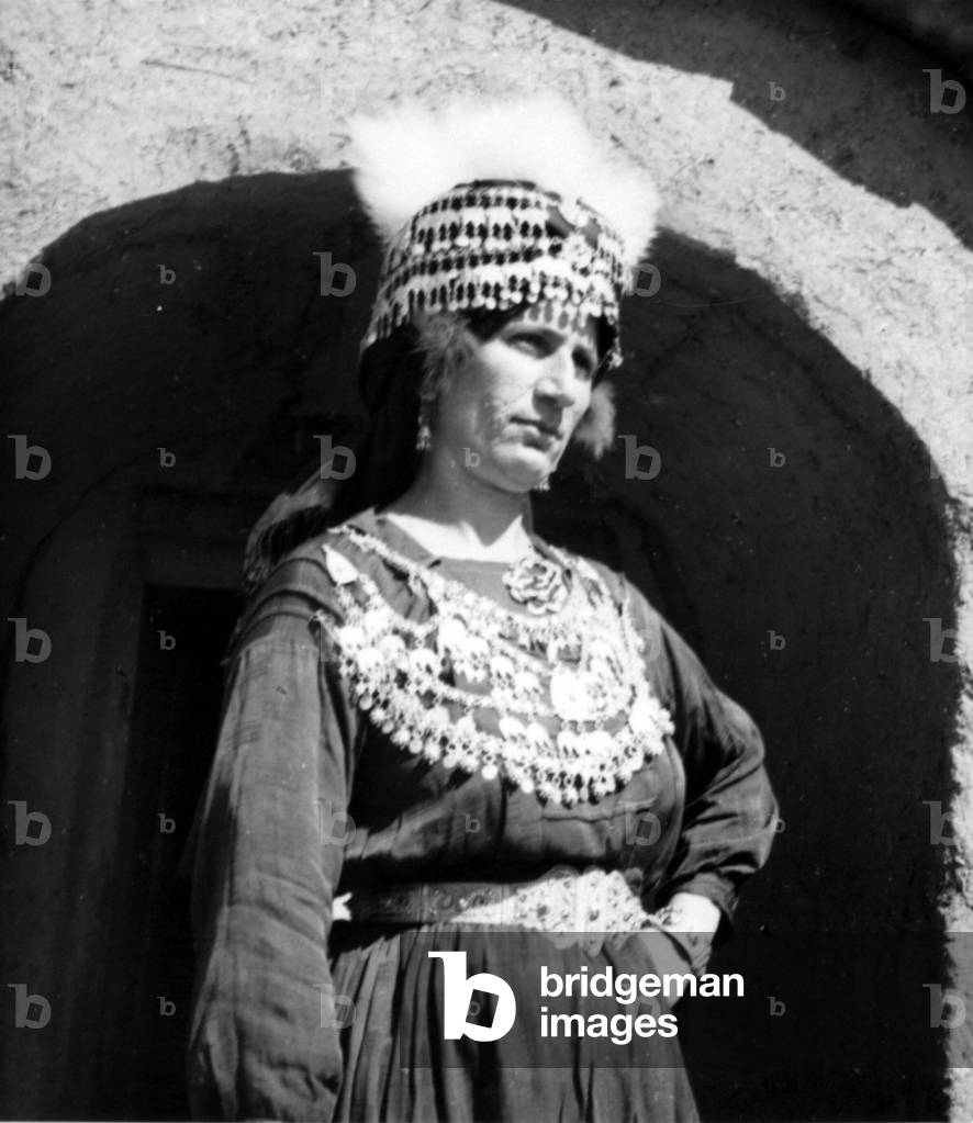 Iraq: Assyrian woman in traditional dress, northern Iraq, 1930s