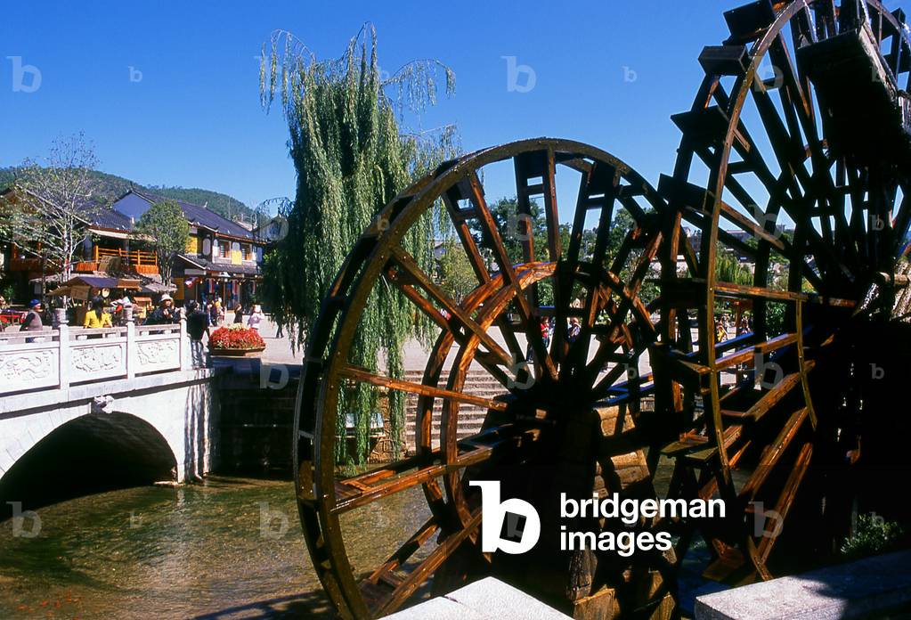 China: Waterwheels at the edge of Lijiang Old Town, Yunnan Province