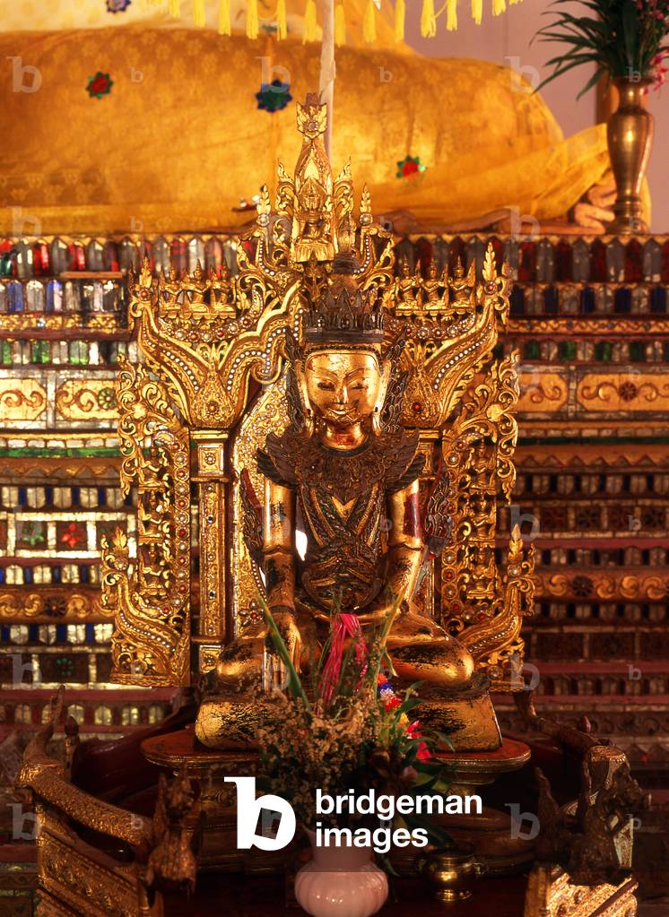Thailand: A small Buddha image in front of the 'Luang Pho To' Shan-style Buddha at Wat Chong Kham (Jong Kham), Mae Hong Son