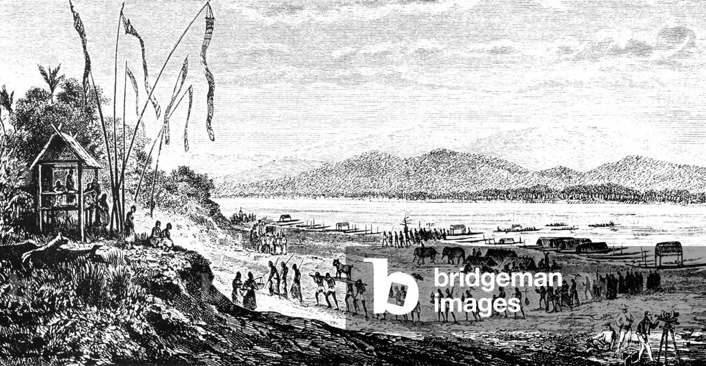 Laos: A French expedition arrives at Ban Bouncang on the Mekong River in southern Laos in March 1867. In this sketch, porters unload cargo and merchandise while one of the commission, Mr Garnier (bottom right), prepares a telescope to observe a lunar ecli