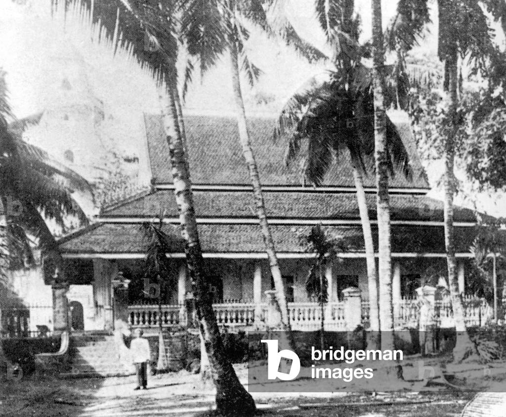 Cambodia: A 1918 photograph of the mosque of Chrang Chames, near Phnom Penh, with its minaret barely visible in the background.