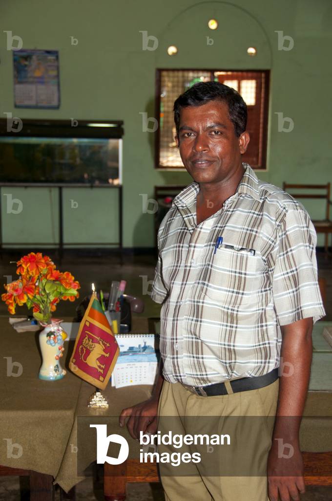 Sri Lanka: The station master at the Mount Lavinia railway station, south of Colombo