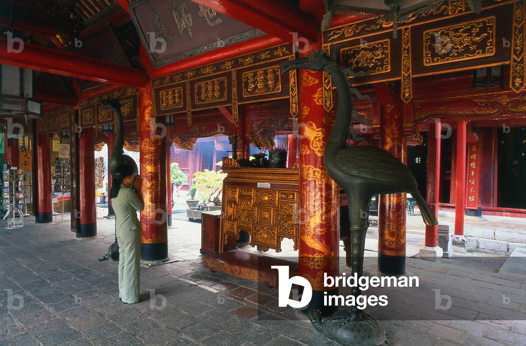 Vietnam: Worshipper at the main altar, Altar to Confucius, Great House of Ceremonies, Temple of Literature (Van Mieu), Hanoi