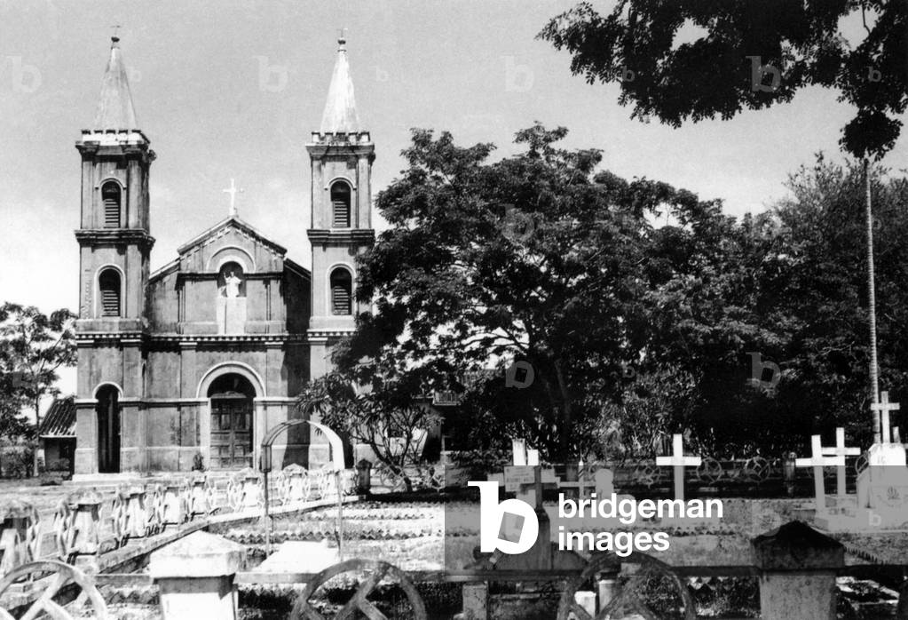 Vietnam: Cemetery in front of the Catholic Church, Hoi An (c. 1950)