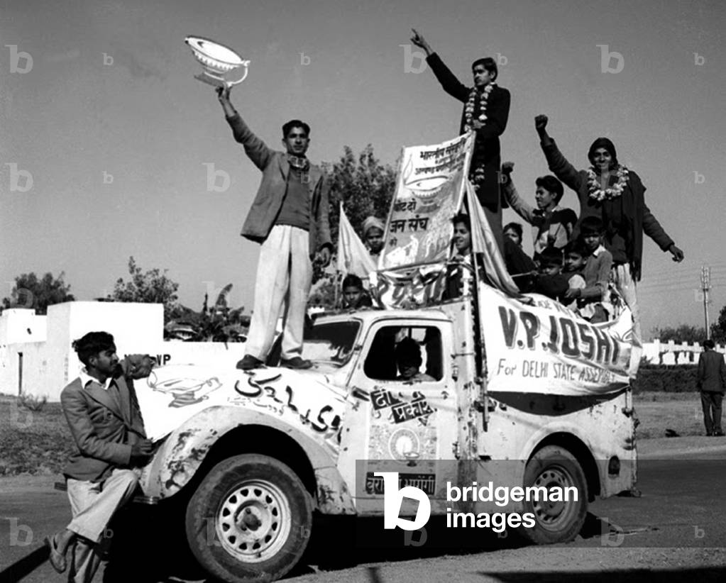 India: First Lok Sabha general election, Delhi, January 1952. Electioneering for the Jan Sangh on an old truck