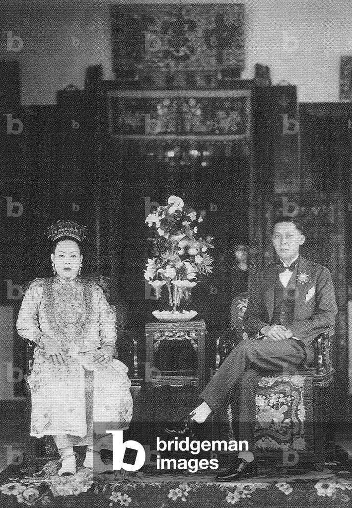 Singapore: A Peranakan bride and groom, early 20th century