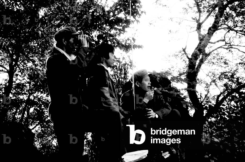 Burma / Myanmar: CPB attacks Hsi-Hsinwan, November 16, 1986. Kyi Myint, CPB commander, with microphone. Communist Party of Burma (CPB)