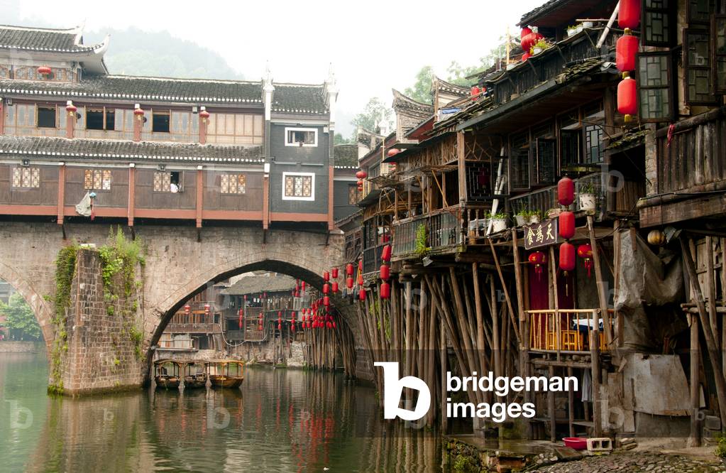 China: Mist hangs over Hong Qiao Bridge, Fenghuang's famed covered bridge