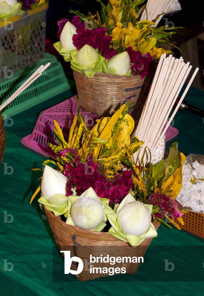Thailand: Basket with incense sticks and lotus flowers used for offerings at the Inthakin or Lak Mueang Festival, Wat Chedi Luang, Chiang Mai