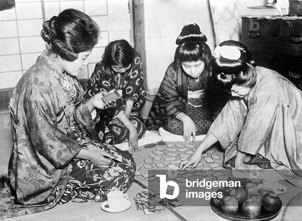 Japan: A group of four Japanese women in traditional dress playing 