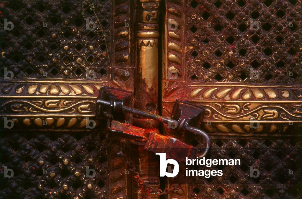 Nepal: An elaborate lock on a temple door in Kathmandu