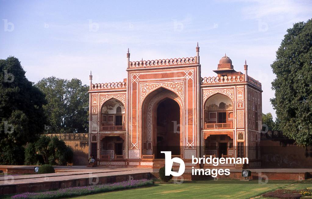 India: The red sandstone western gateway with its prominent iwan (portico) at the tomb of I'timad-ud-Daulah, Agra
