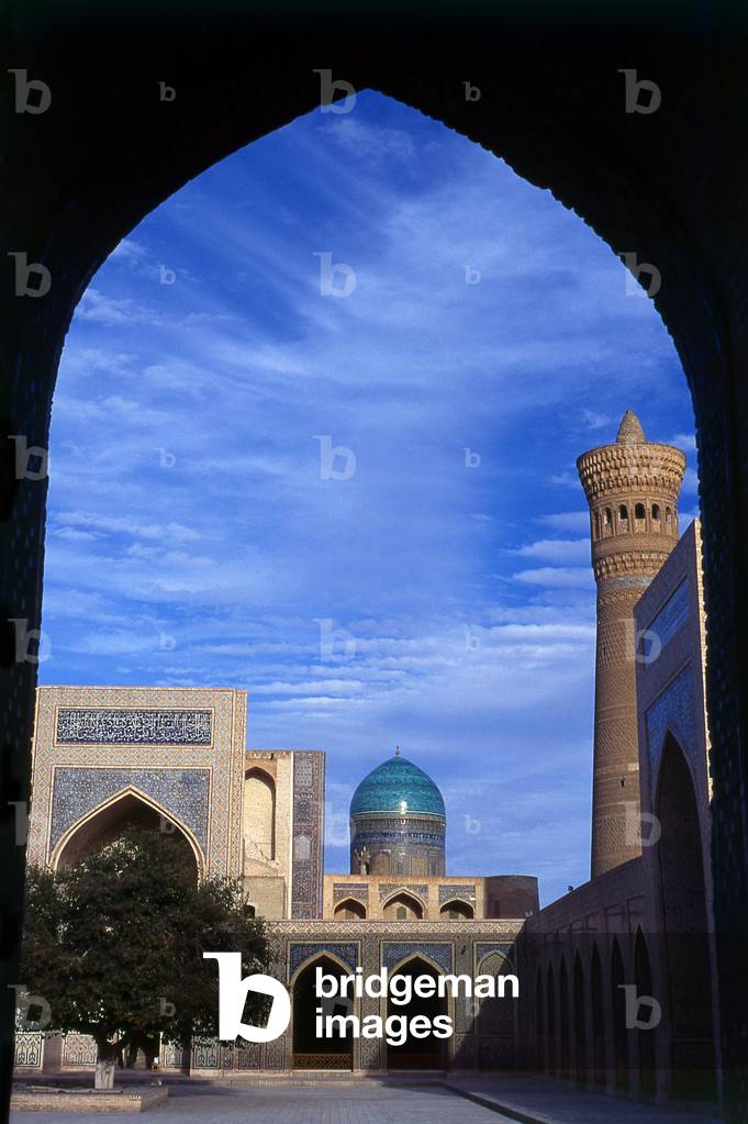Uzbekistan: The main courtyard of the Kalyan or Kalon mosque and minaret, part of the Po-i-Kalyan complex (in the background is the dome of the Mir-i-Arab Madrasah, Bukhara