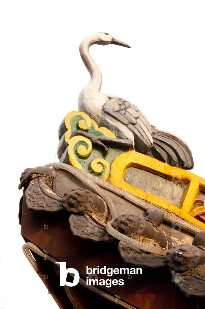 China: Bird detail on a roof at Ming-era Buddhist Qianming Si (Qianming Temple), Guiyang, Guizhou Province