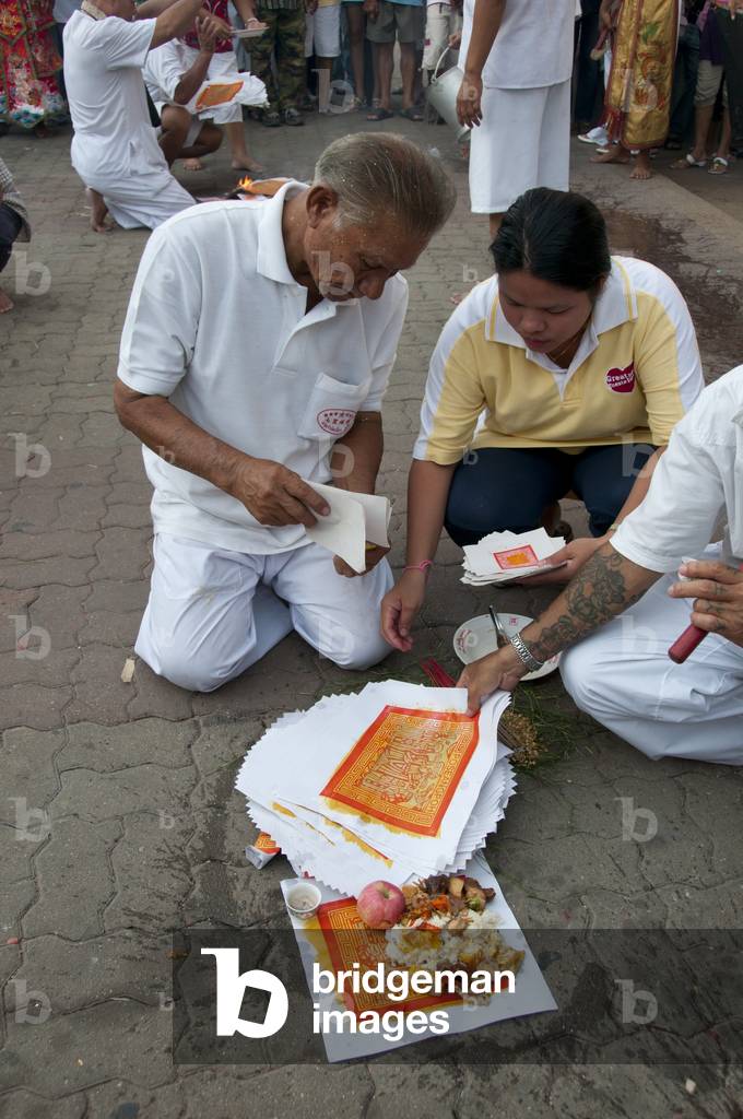 Thailand: Food offerings placed on Taoist symbols, San Chao Chui Tui (Chinese Taoist temple), Phuket Vegetarian Festival