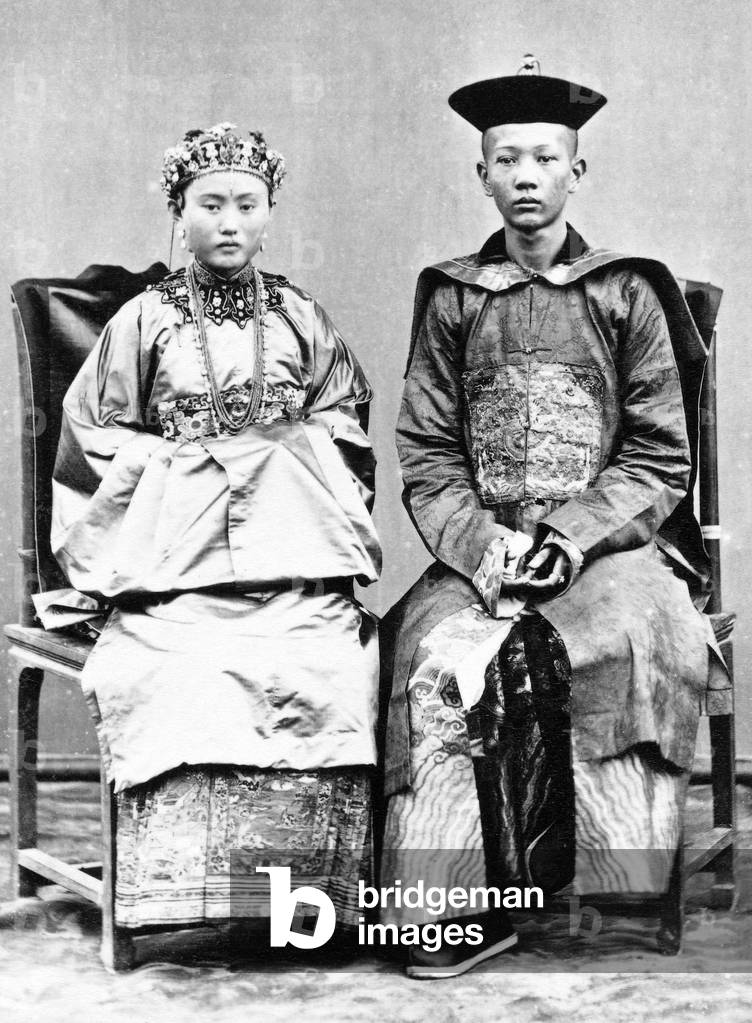 Indonesia / Maluku (Moluccas): Studio portrait of a Chinese merchant with his wife. Ternate, Woodbury and Page, 1870