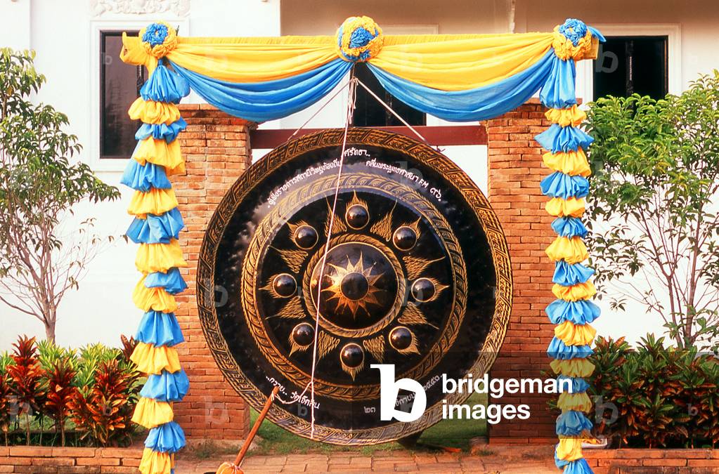 Thailand: Giant gong set up for Songkran (Thai New Year Water Festival) in the grounds of Wat Chetlin, Chiang Mai