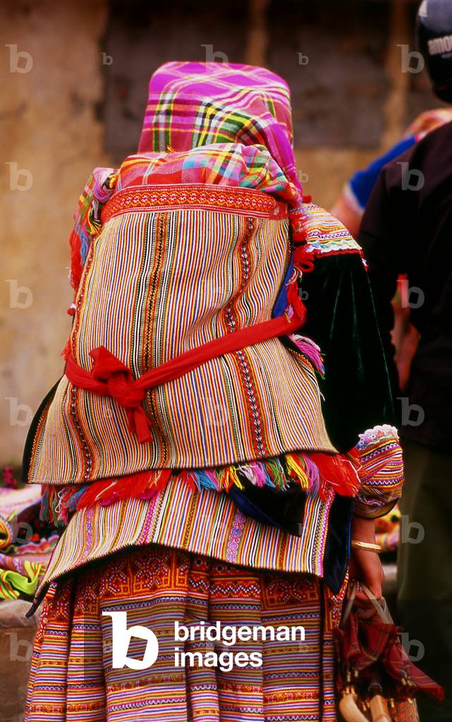 Vietnam: Flower Hmong woman with her baby on her back, Bac Ha Sunday Market, Lao Cai Province