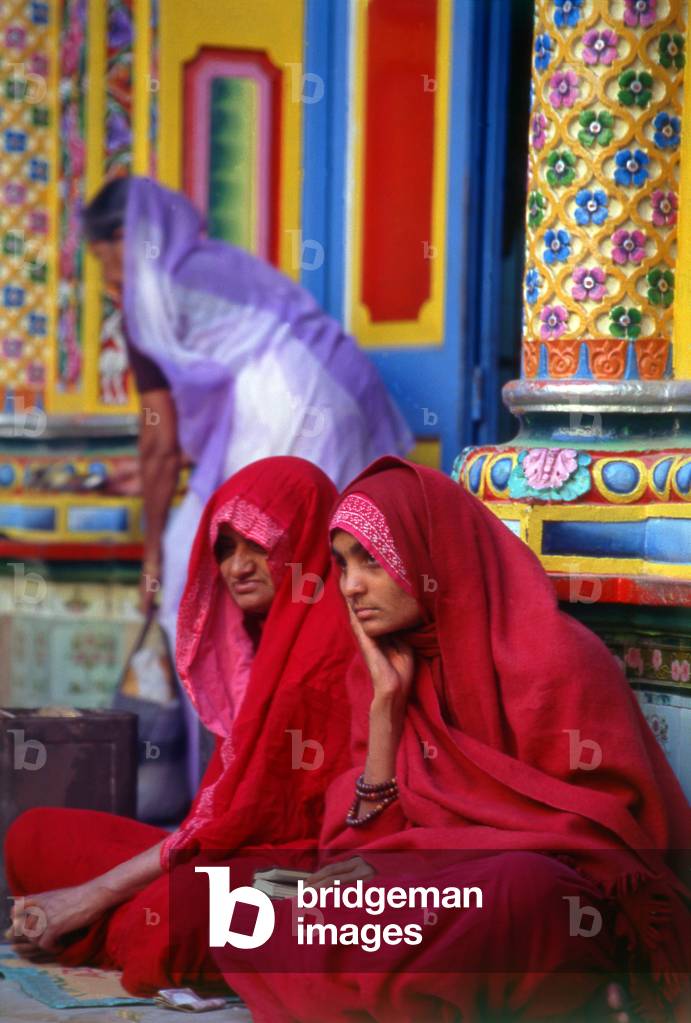 India: Two women participating in the 