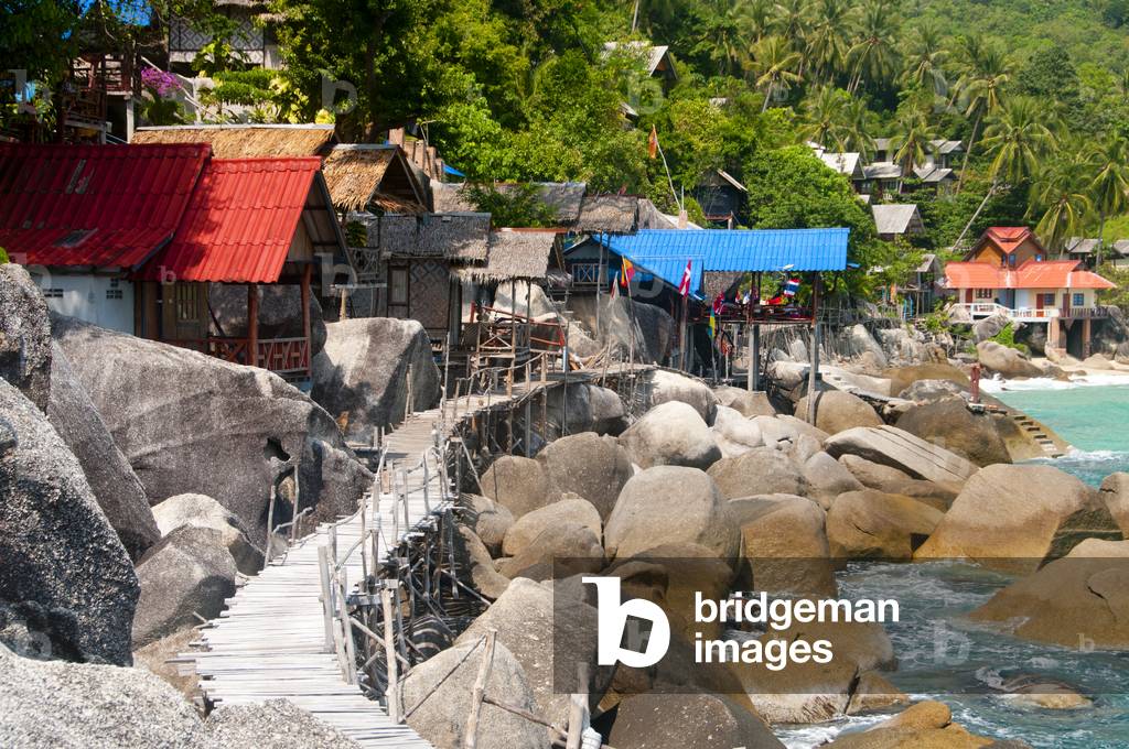 Thailand: Bungalows face the sea next to a precarious wooden walkway, Yuan Beach (Hat Yuan), Ko Phangan