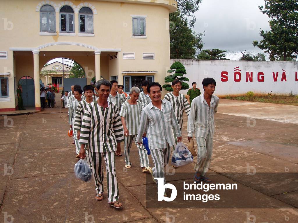 Vietnam: Former inmates being released from a re-education prison, location unknown