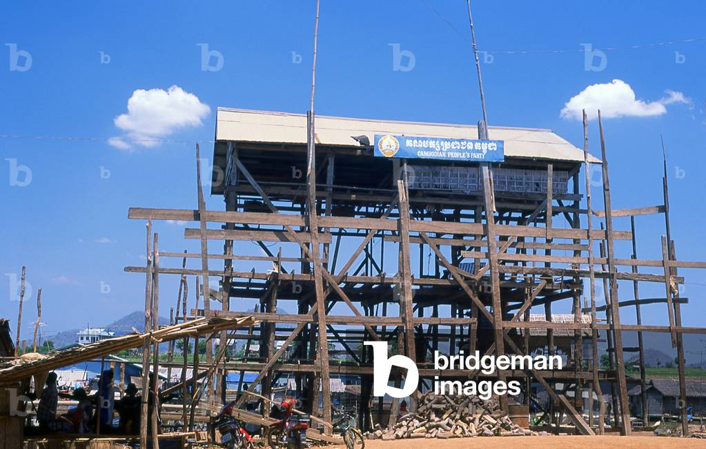 Cambodia: New stilted riverside housing for the Cambodian People's Party (showing just how high the Tonle Sap River can rise), Kompong Chhnang