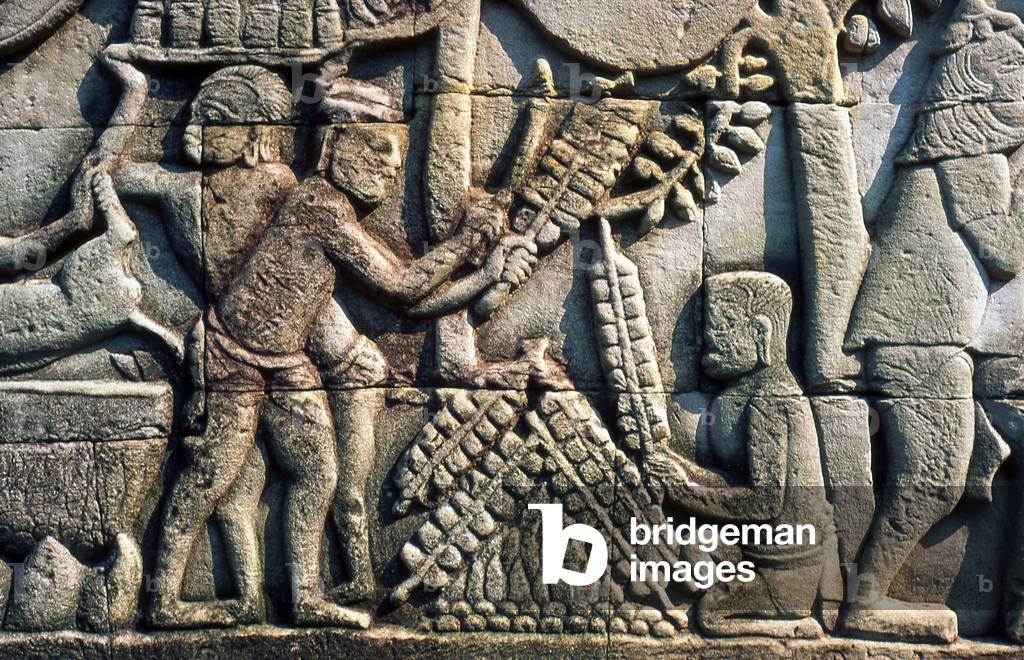 Cambodia: A kitchen and cooking scene from ordinary civilian life during the time of the Khmer empire, bas-relief, The Bayon, Angkor Thom