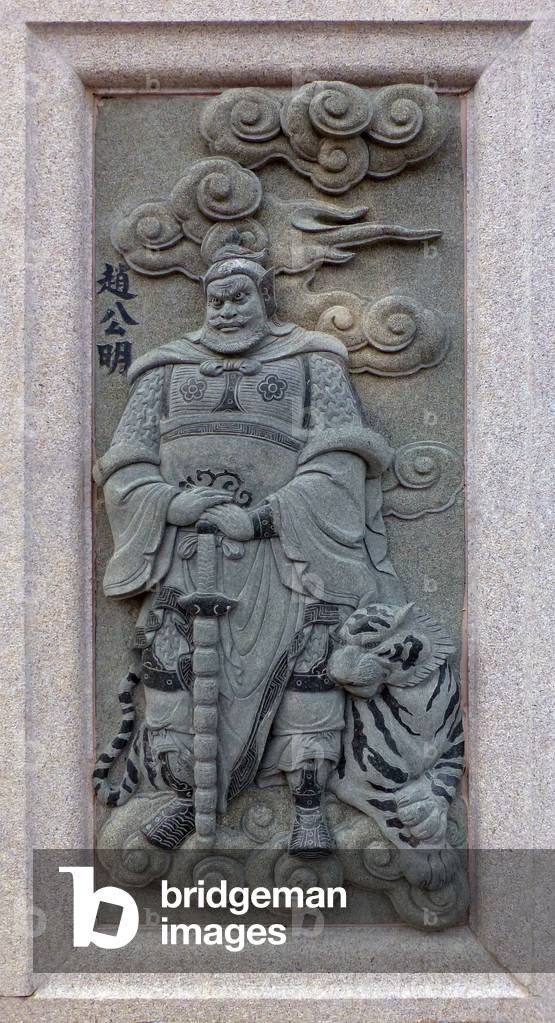 Malaysia / China: Carving of Zhao Gongming, depicting his role in the 16th Century Ming Dynasty novel <i>Fengshen Yanyi</i> ('Investiture of the Gods'). From Ping Sien Si Temple, Pasir Panjang Laut