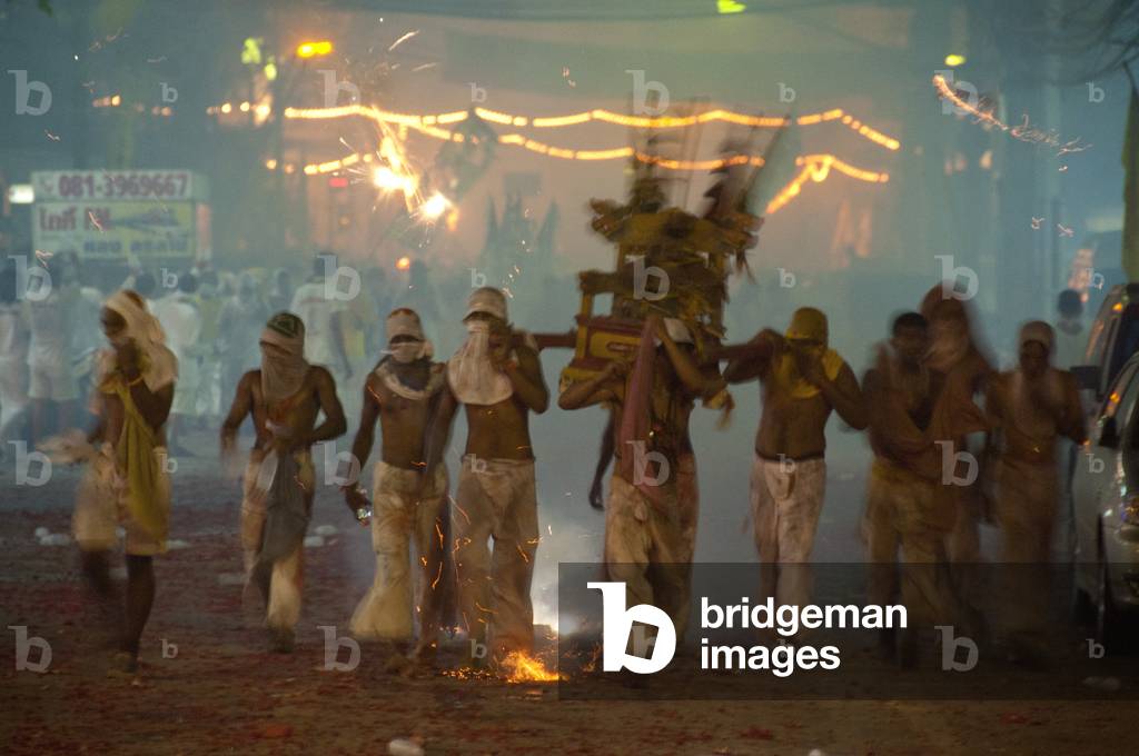 Thailand: Shrine bearers race through the streets in the night parade, Phuket Vegetarian Festival