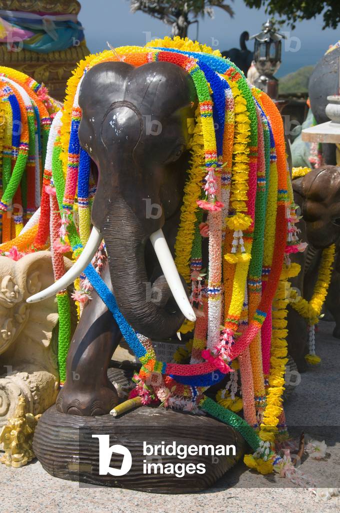 Thailand: Elephant statues surrounding the Brahma shrine above Cape Phromthep (Laem Phromthep), Phuket
