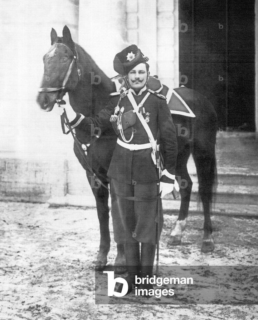 Russia: A Cossack sergeant of the Life Guards Composite Cossacks Regiment, Siberian Company. Full dress uniform with horse. Pavlovsk, 1914.
