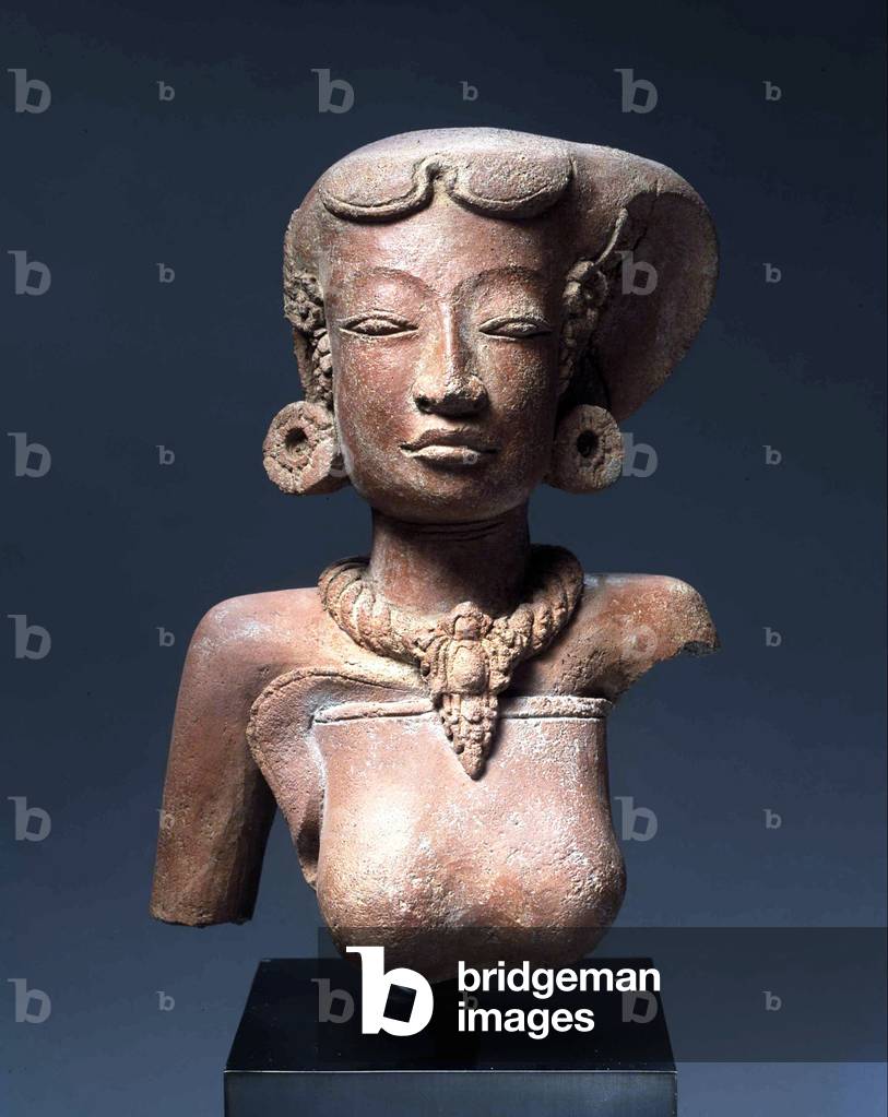 Indonesia: Terracotta bust of a young noblewoman, perhaps of the royal court. Majapahit Empire, Java,13th-14th century