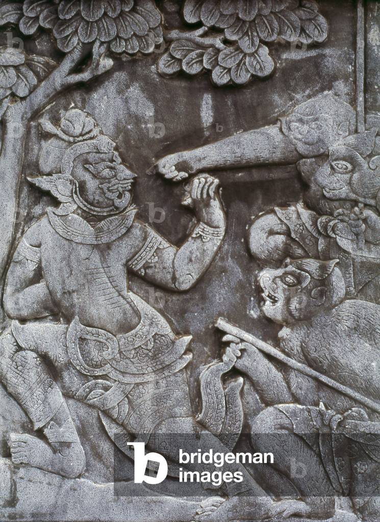 Thailand: A scene from the Ramakien (the Thai Ramayana story) on stone around the Phra Ubosot (Main Chapel), Wat Pho (Temple of the Reclining Buddha), Bangkok