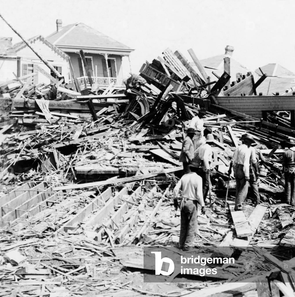 USA: The 1900 Galveston Hurricane. 'A body trapped in the ruins', 1900