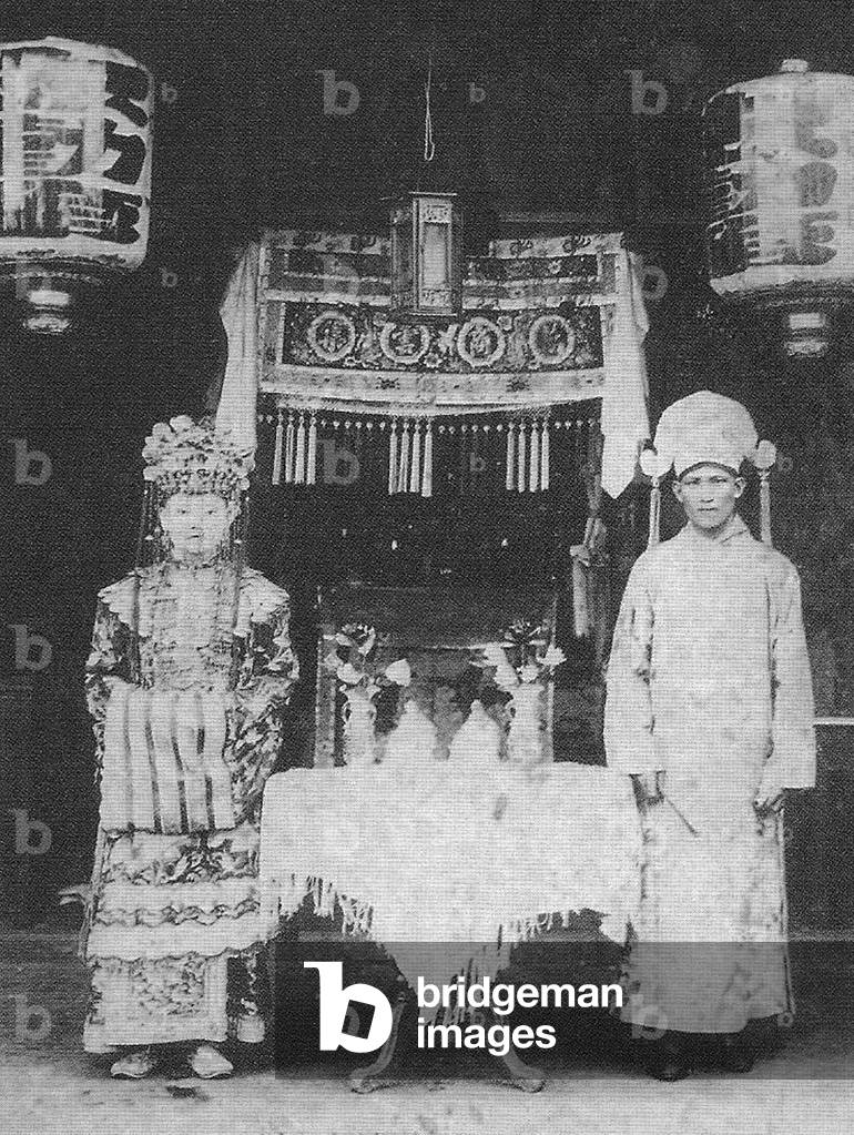 Singapore: A Peranakan bride and groom, early 20th century