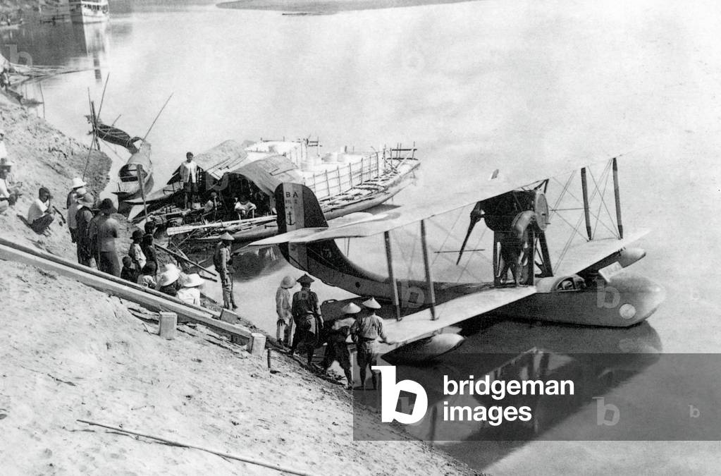 Laos: Vientiane mail is loaded onto a hydroplane on the Mekong River for delivery to Paklay and Luang Prabang, 1930.