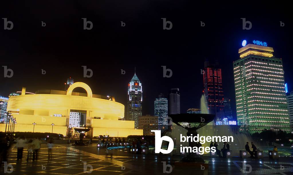 China: Shanghai Museum (Shanghai Bowuguan) in People's Park (Renmin Gongyuan) with surrounding skyscrapers, Shanghai