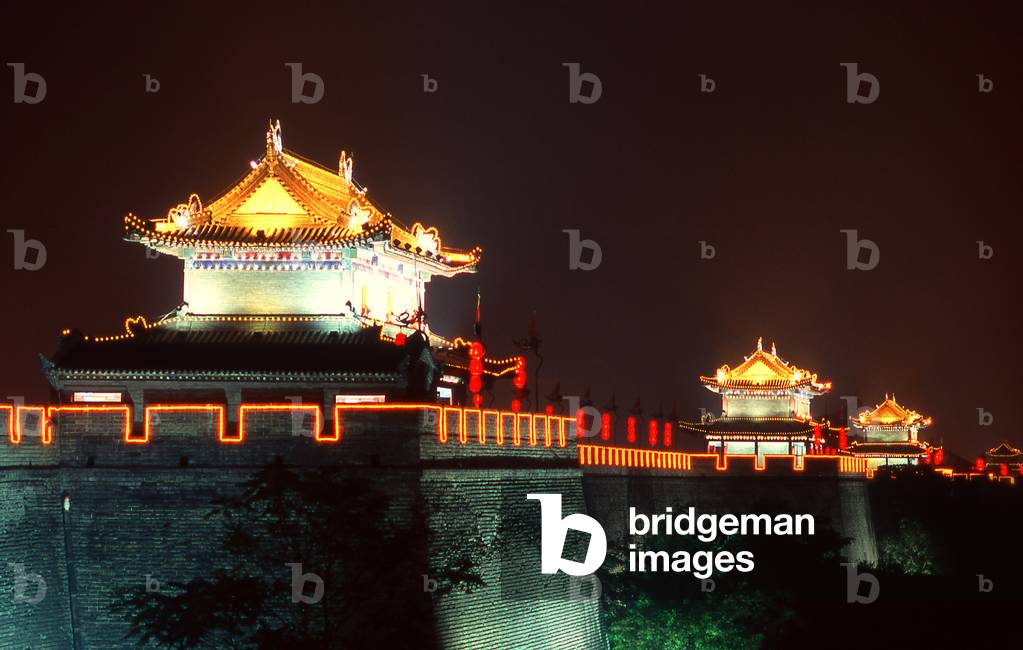 China: Guard towers on Xian's ancient city wall, by night, Xi'an, Shaanxi Province