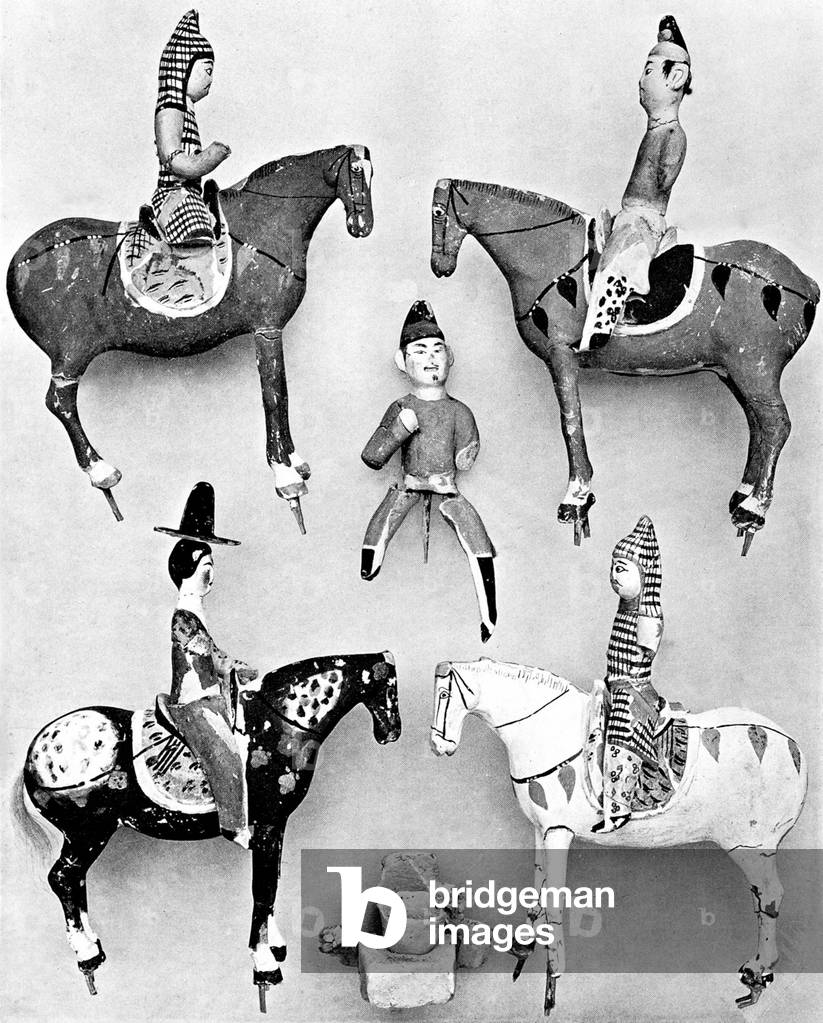 China: Clay figurines of horses and riders from Astana Cemetert, Turfan, Xinjiang.
