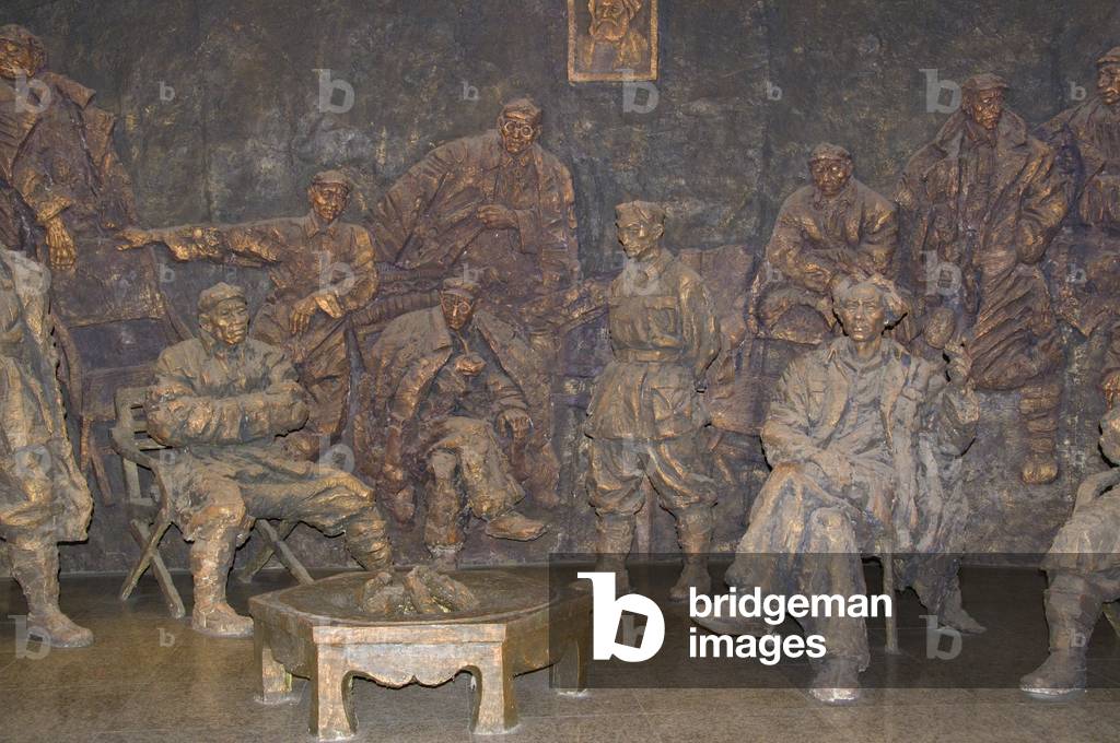 China: Sculpture of conference participants (Mao is seated smoking on the right), Zunyi Conference Hall Revolutionary Museum, Zunyi, Guizhou Province