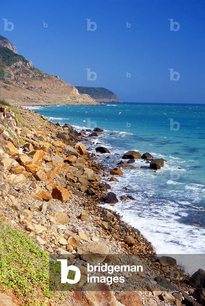 Vietnam: The rocky coastline of Con Son Island, Con Dao National Park, Con Dao Archipelago